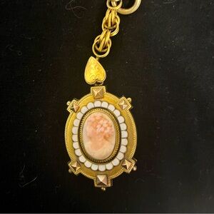 Antique Victorian style double sided cameo necklace.